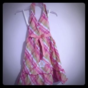 Lot of girls dresses and skirt.